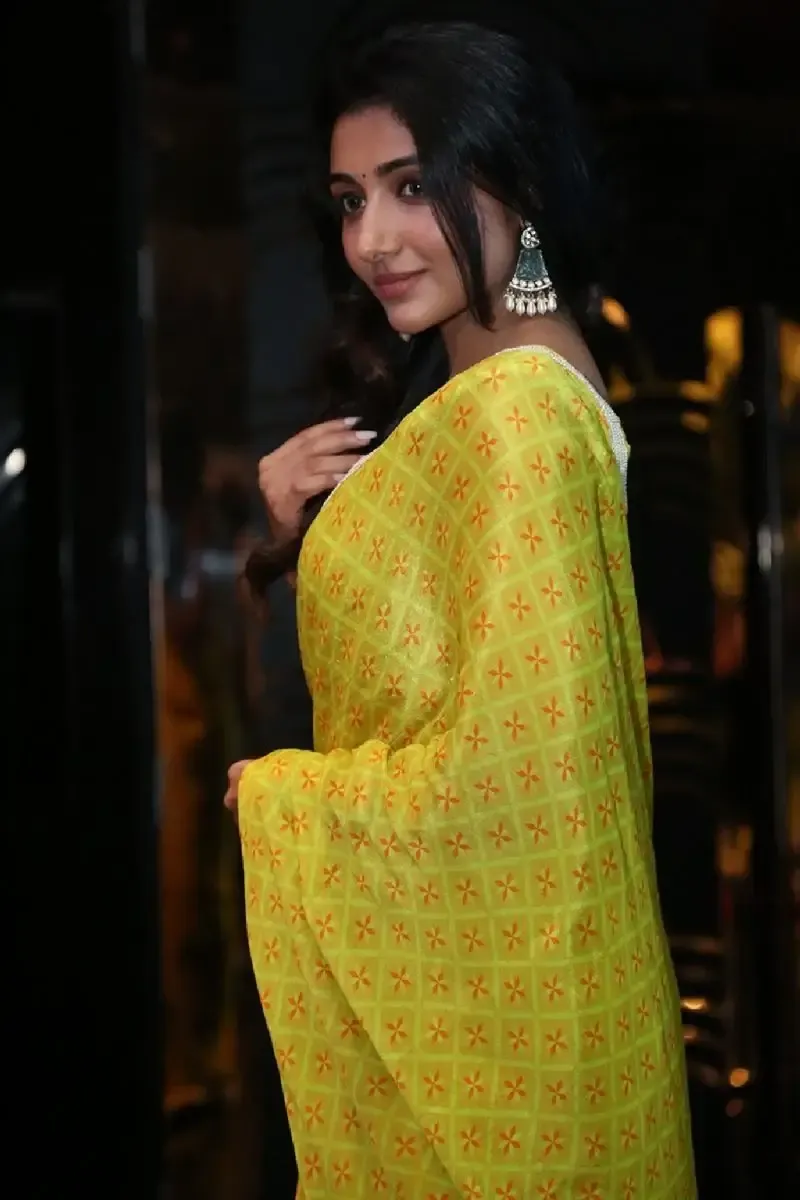 Indian Actress Mirnaa Menon in Yellow Saree at Ugram Movie Teaser Launch